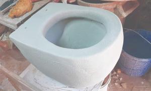 Ceramic toilet under production process