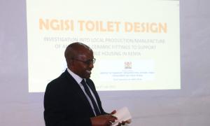 PS Solomon Kitungu presenting keynote speech at the launch of ceramic toilet at UoN