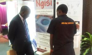 Maj. Gen (Rtd) Dr. Gordon Kihalangwa at the KBRC exhibition stand during the Africa Public Service Day 2022