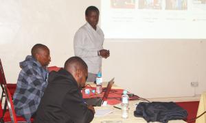 Mr. Evans Kimathi making a presentation